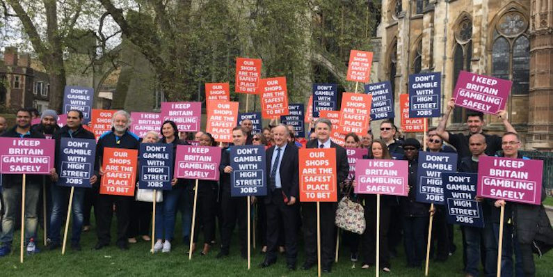 Betting shop staffers and MPs protest