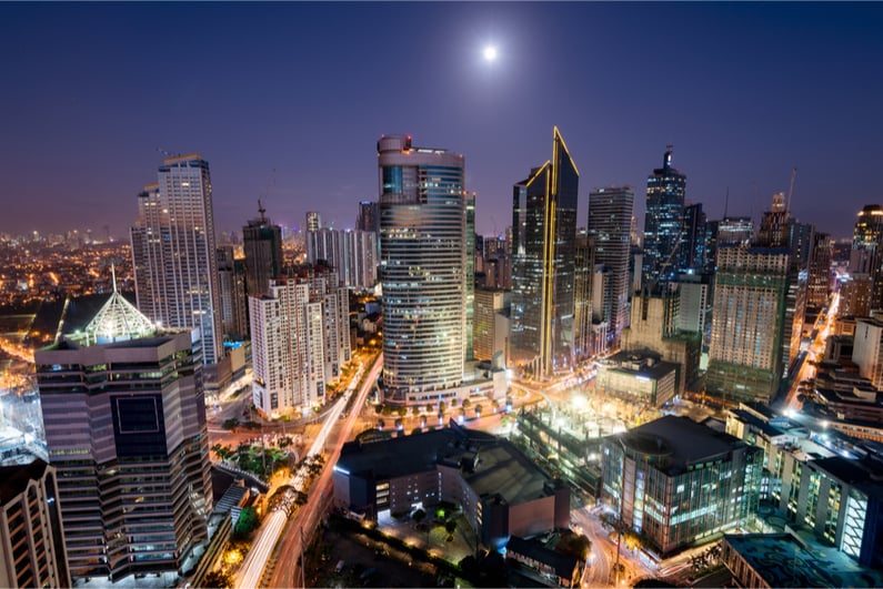 Makati Skyline at night. Makati is a city in the Philippines` Metro Manila region and the country`s financial hub.