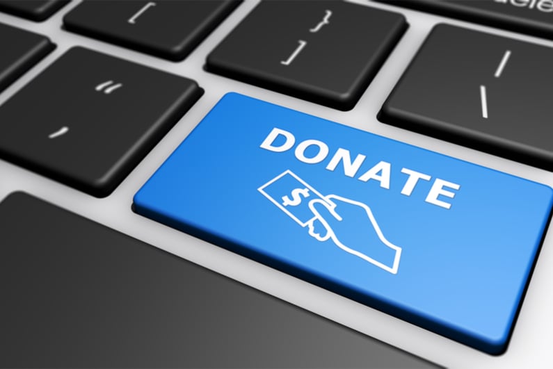 web-donations-concept-blue-computer-key