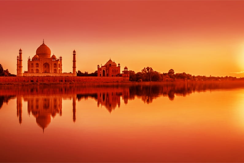 Panoramic view of Taj Mahal during sunset reflected in Yamuna river, in Agra , Uttar Pradesh, India
