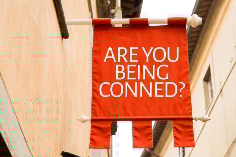 Banner that asks ARE YOU BEING CONNED?