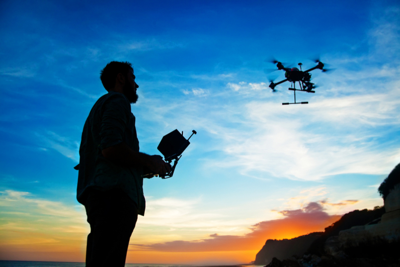 Man flying drone