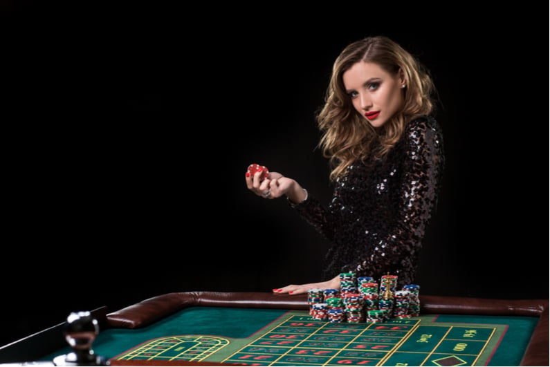 Woman gambling in casino