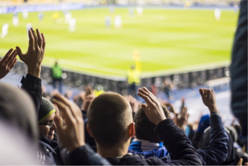 Football fans cheering