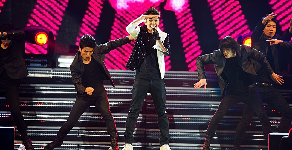 boy band members of Big Bang performing on stage