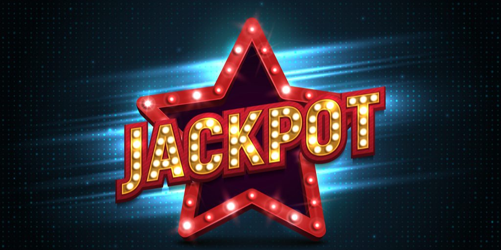 illuminated sign with star background reads jackpot