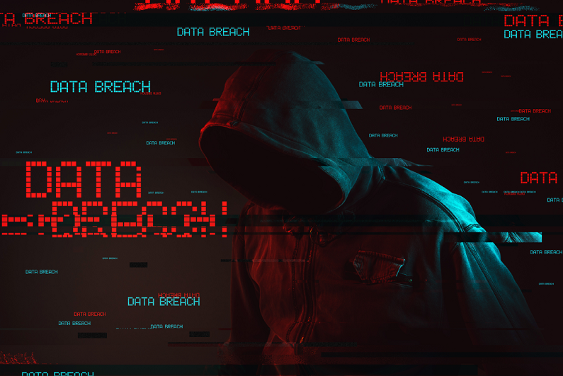 Data breach concept with faceless hooded male.