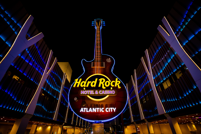Nighttime view of giant guitar outside entrance of Hard Rock Atlantic City.