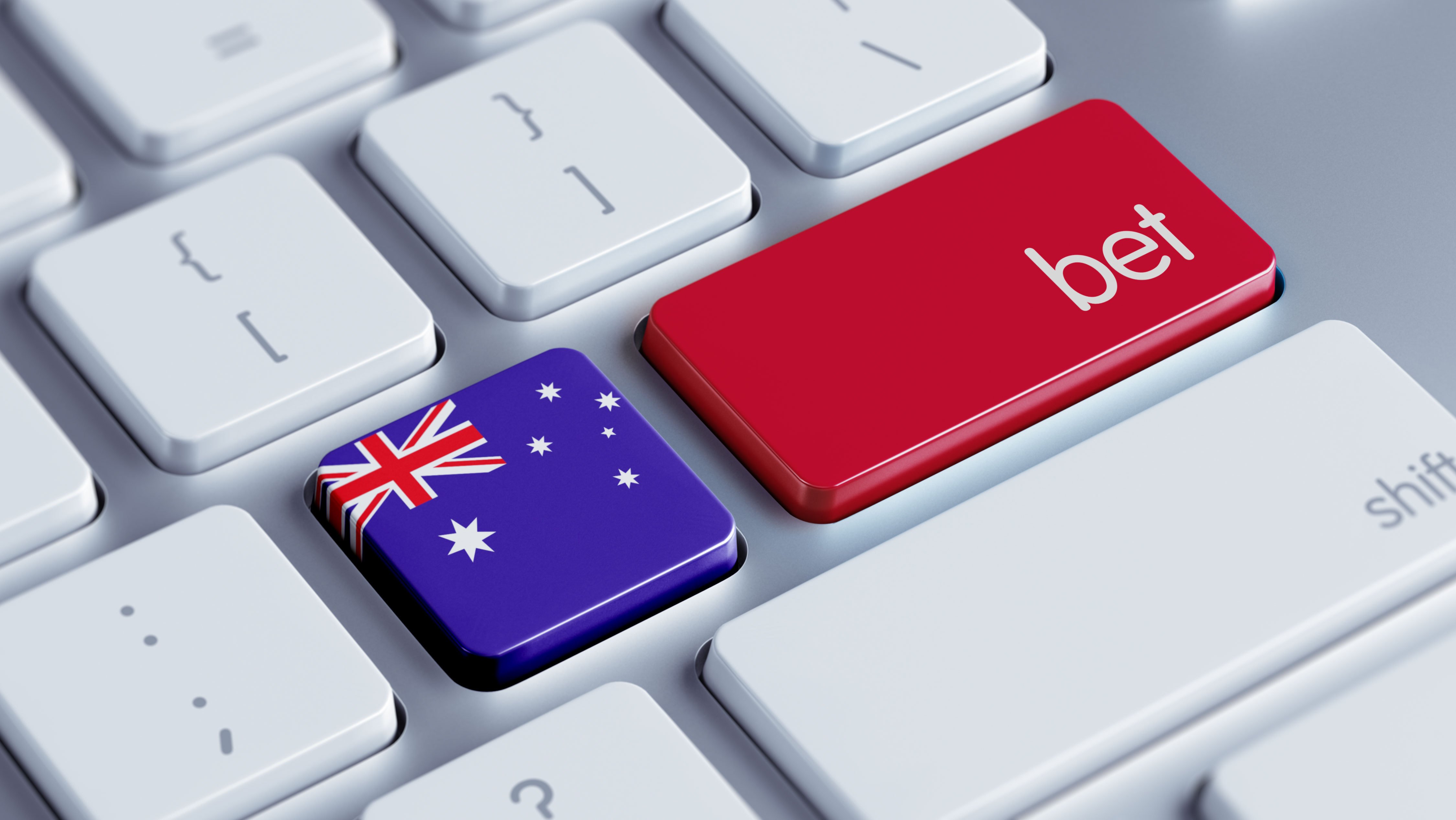 Computer keyboard with key showing Australian flag and a "bet" key