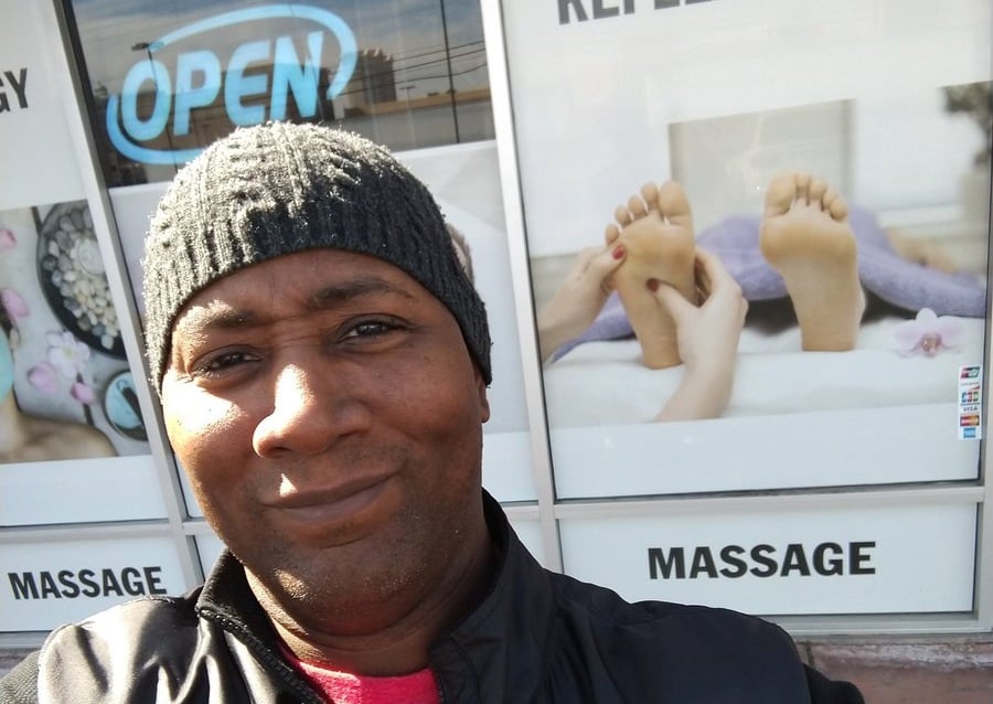 Poker pro Raymond Davis outside massage parlor