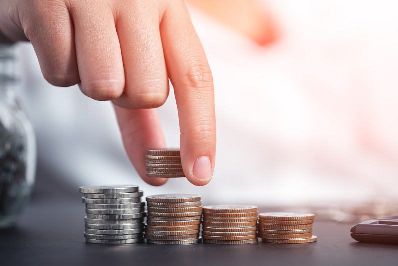 female stacking coins