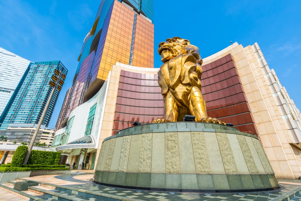 Gold lion stature outside MGM casino resort in Macau
