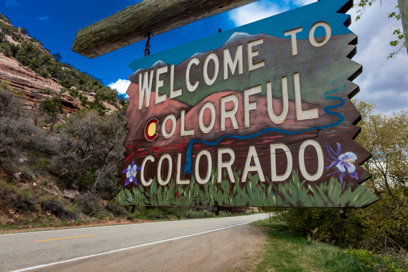 "Welcome to Colorful Colorado" state road sig