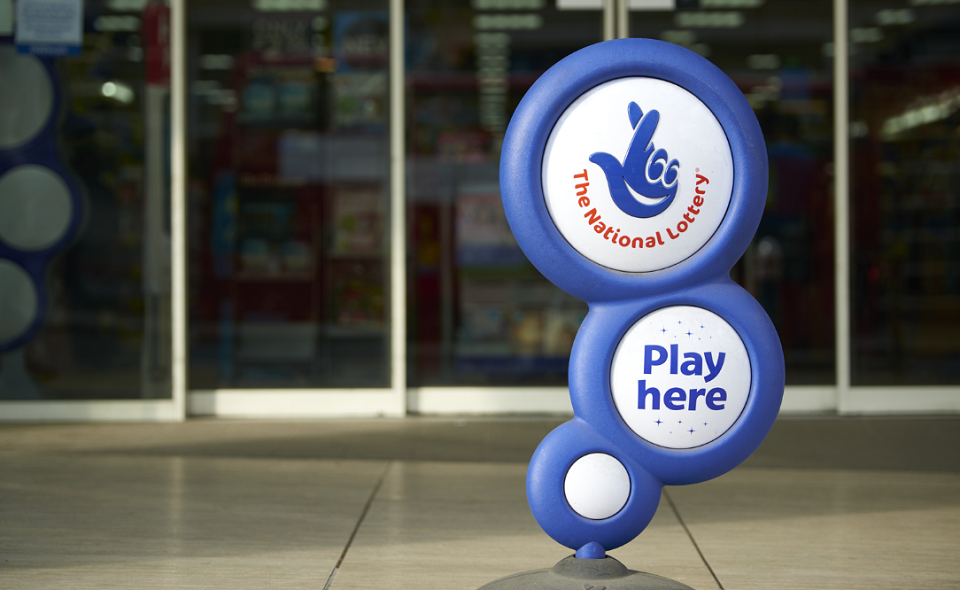 National Lottery sign in front of shop