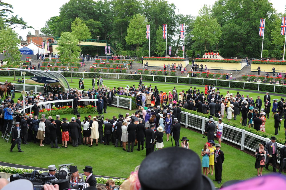 elegantly dressed crowd at Royal Ascot annual horse racing event