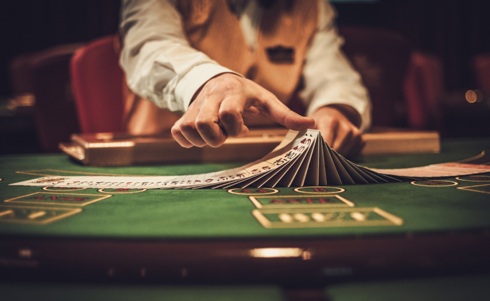 croupier behind gambling table in a casino