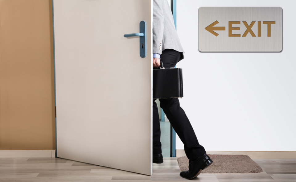 businessman exiting office