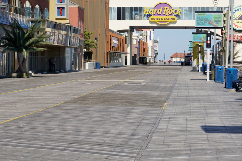 Empty Atlantic City Boardwalk with Hard Rock sign in background
