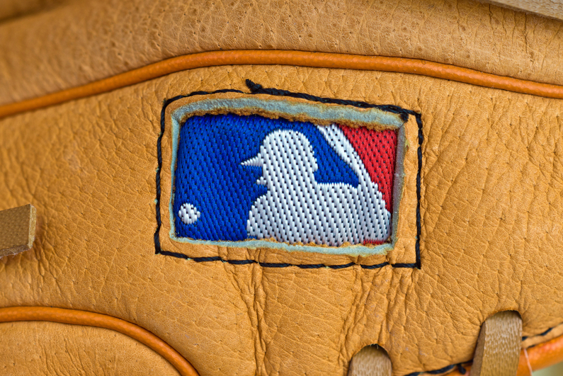 MLB logo on baseball glove