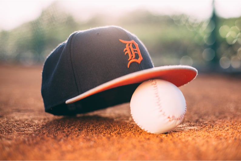 Detroit Tigers cap resting on a baseball