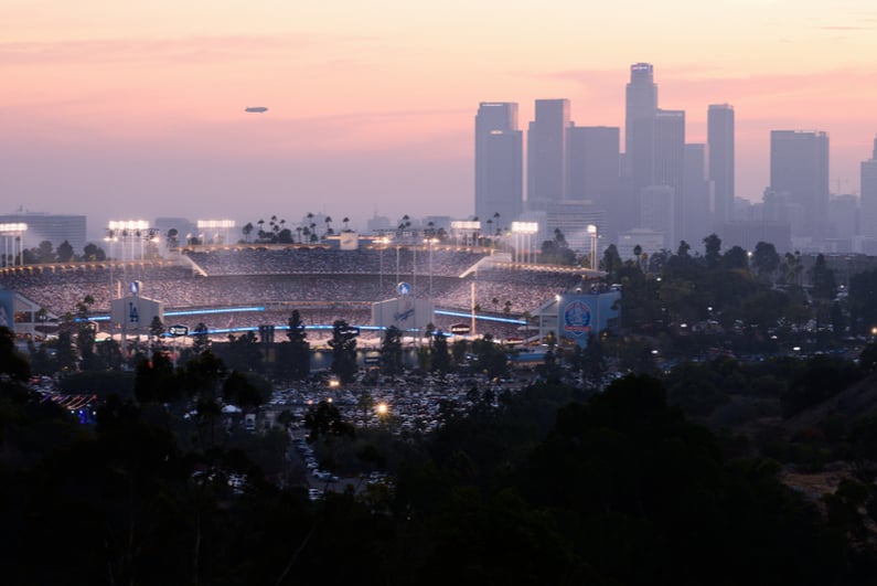 Distant view of Dodger Stadium with downtown Los Angeles in background