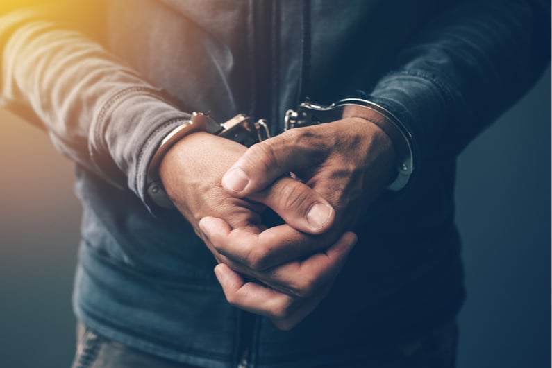 Closeup of man in handcuffs
