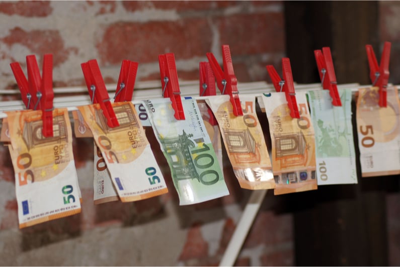 Euro bills hanging on a clothesline