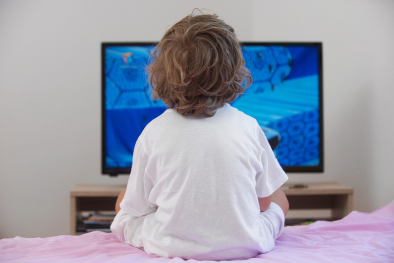 child watching TV