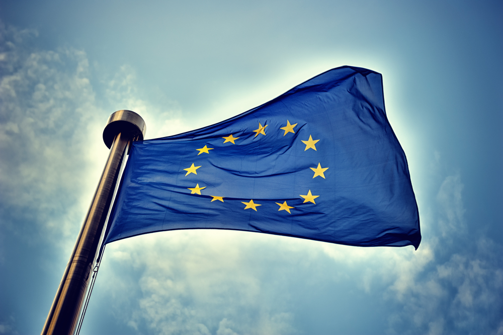 European Union flag against a blue sky background
