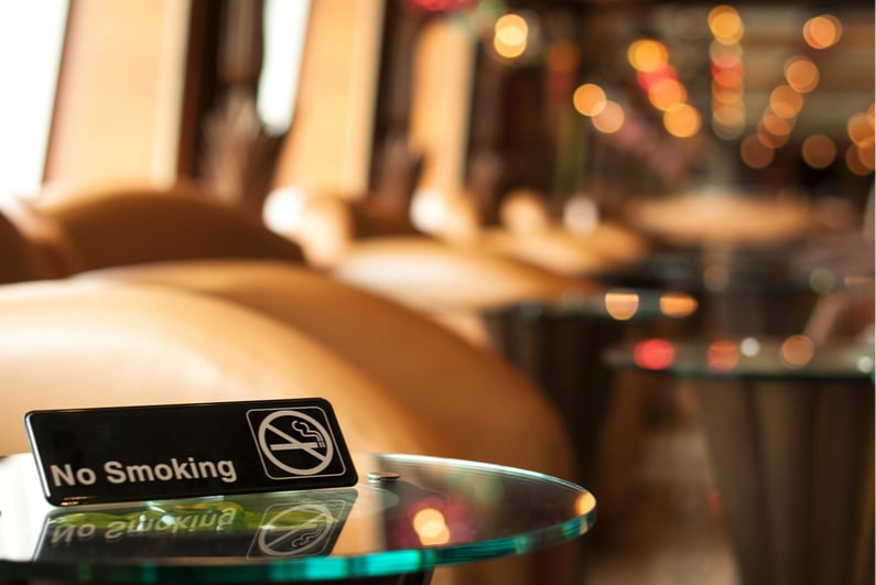 No smoking sign on glass table