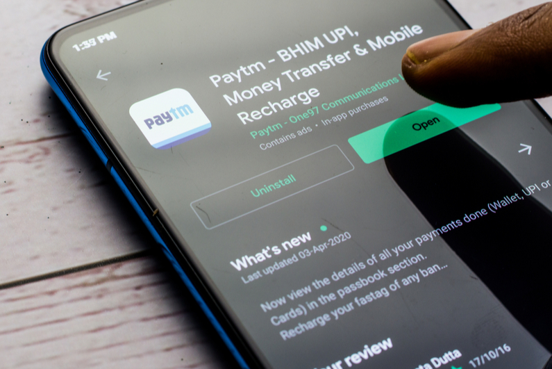 Paytm download page on a mobile phone screen