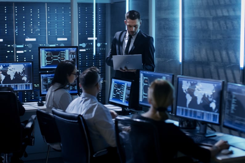 Employees in a computer control center