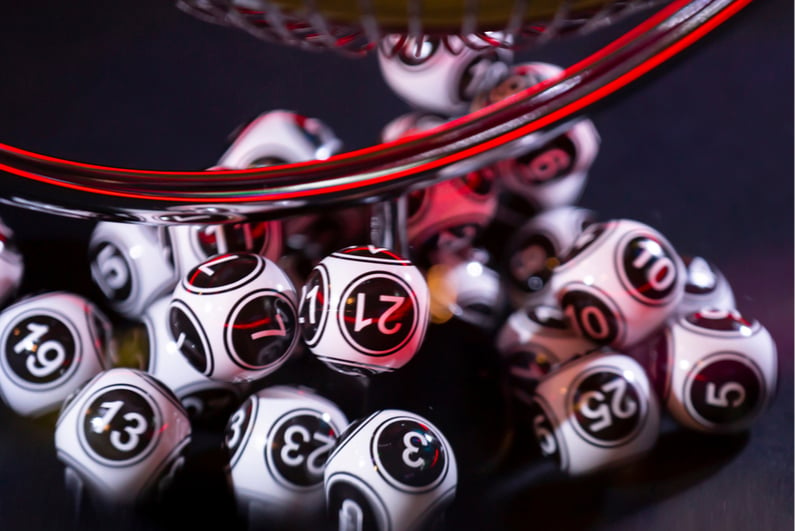 Black and white lottery balls