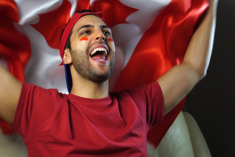 sports fan with Canadian flag