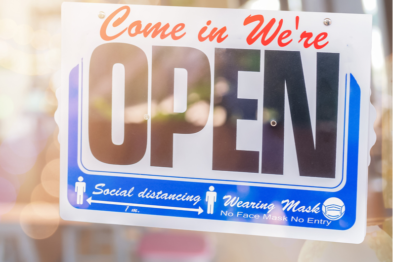 "Come In We're Open" window sign