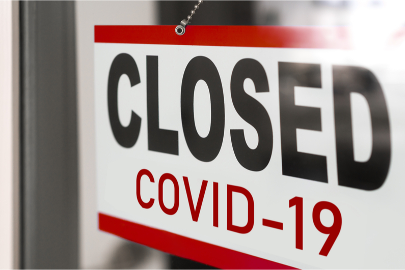 Closed COVID-19 door sign