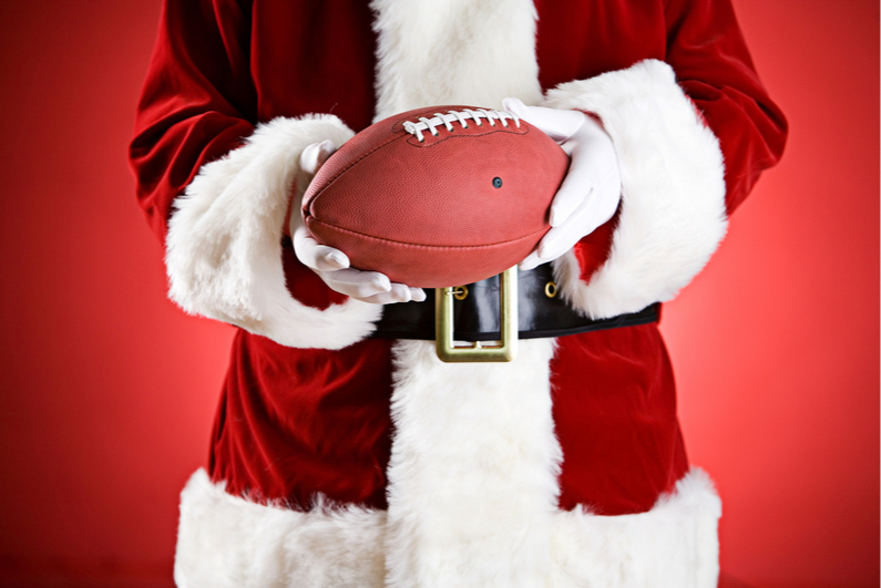 Santa holding a football