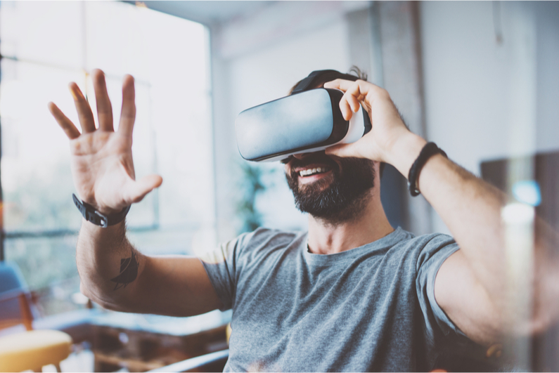 bearded man playing VR