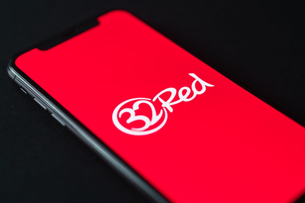 32Red logo on a phone screen