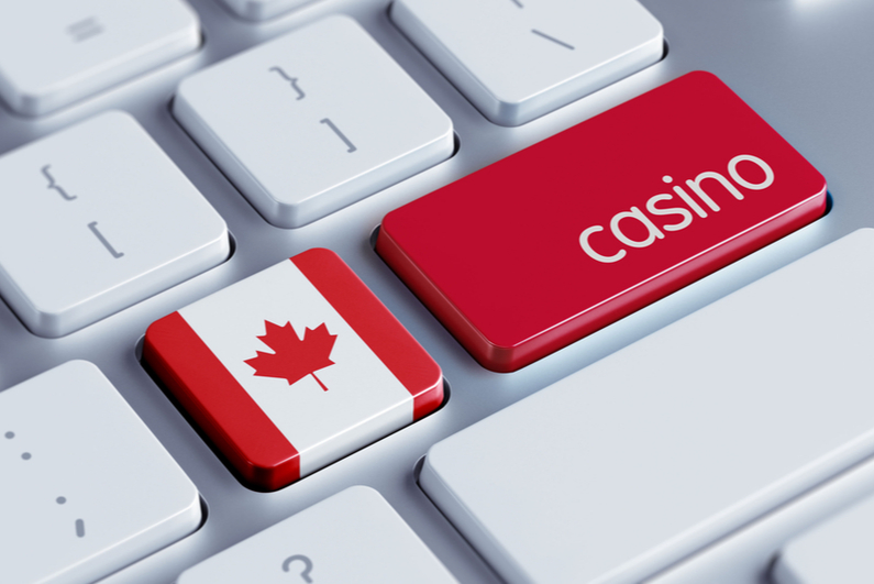 Computer keyboard with a Canadian flag key and a red key reading "casino"