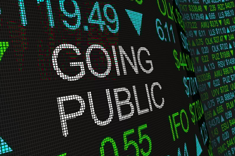 Stock ticker with "GOING PUBLIC" inserted in the middle