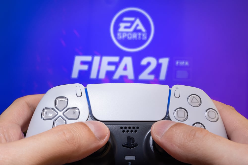 FIFA 21 logo on screen with controller