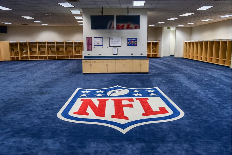 NFL logo on locker room floor