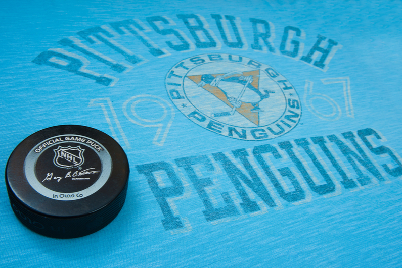 Pittsburgh Penguins logo and puck