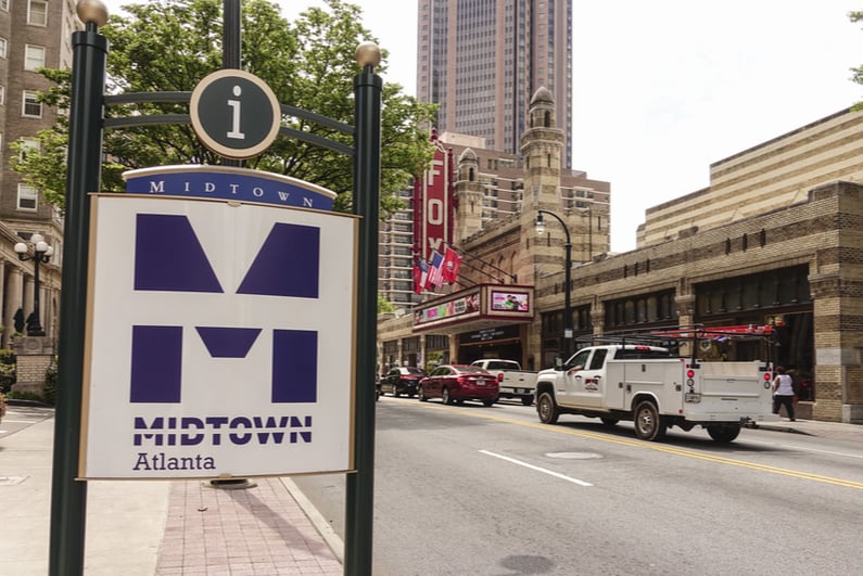 Midtown Atlanta sign with the Fox Theater in the background