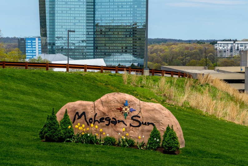 Mohegan Sun logo on a rock outside the casino