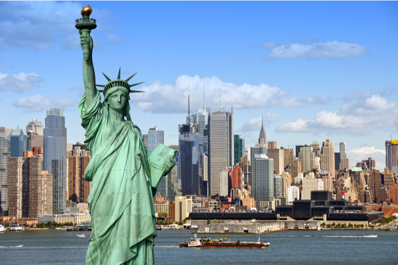 Statue of Liberty in front of the NYC skyline