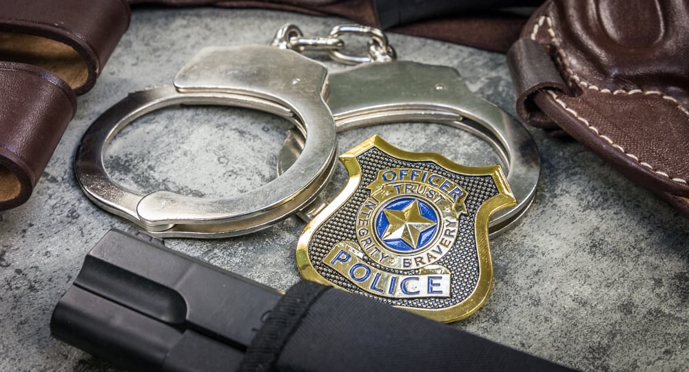 Police badge with handcuffs