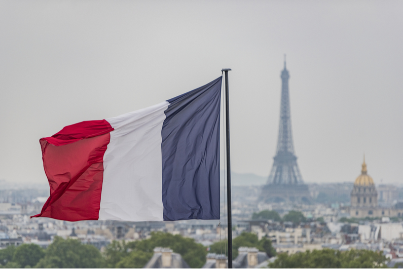 French flag with the Eiffel tower in the background