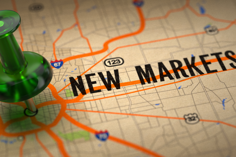 Pushpin on a map labeled "New Markets"